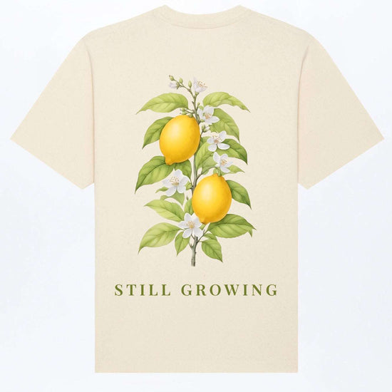 Beiges relaxed Heavy T-Shirt mit Zitronen-Print vorn „STILL GROWING“