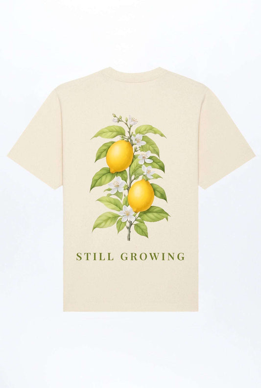 Beiges relaxed Heavy T-Shirt mit Zitronen-Print vorn „STILL GROWING“