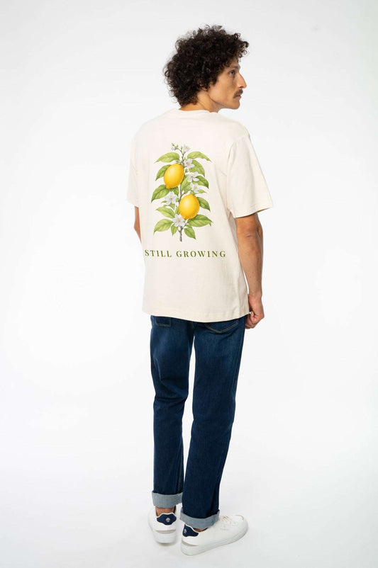 Beiges relaxed Heavy T-Shirt mit Zitronen-Print hinten „STILL GROWING“