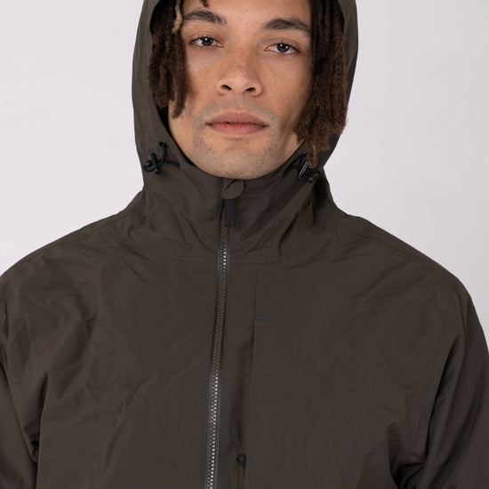 M-TCM3538-NIMBUS-Regenjacke-aus-Recyceltem-Polyester-Fair-Trade-T-Shirt-XENUX-Black-Olive-Green-Vorne25