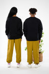 STSU857-boxy-sweatshirt-aus-bio-baumwolle-fair-produzierte-mode-unisex-Black-Hinten